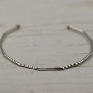 Angled open bangle