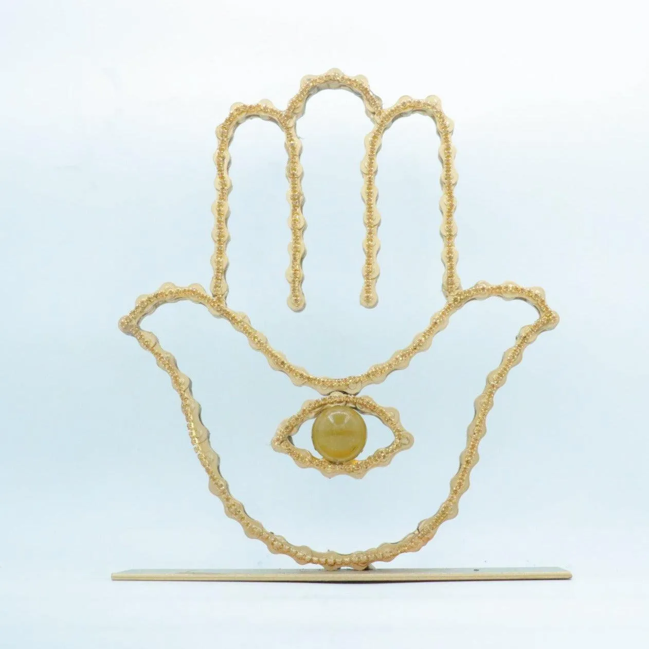 On A Stand Shimmering Hamsa Sculpture